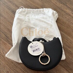 Chloe Black Crossbody Bag with Gold Ring Accent